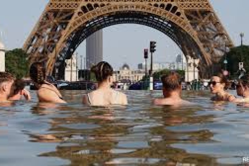 40 Drown Across France As It Sees Its Hottest Day EverPeople cool off in the Trocadero Fountain next to the Eiffel Tower