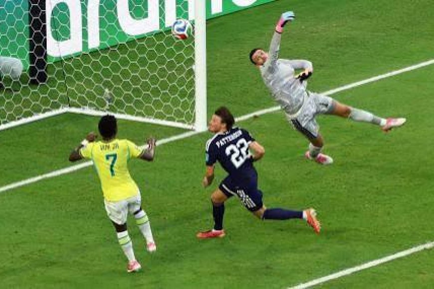 Brazil romp into World Cup knock-outs after Vinicius brace