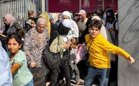 Palestinians wait at border between Gaza and Egypt as uncertainty clouds reopening of Rafah crossing