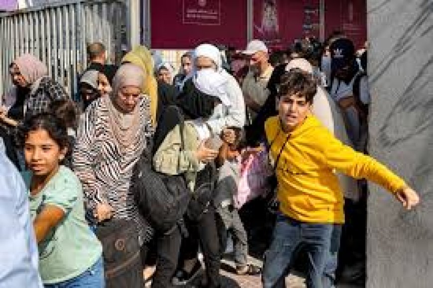 Palestinians wait at border between Gaza and Egypt as uncertainty clouds reopening of Rafah crossing