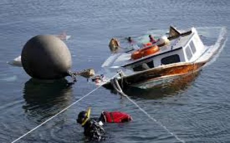 Divers find woman found clutching child inside sunken boat; death toll at 9