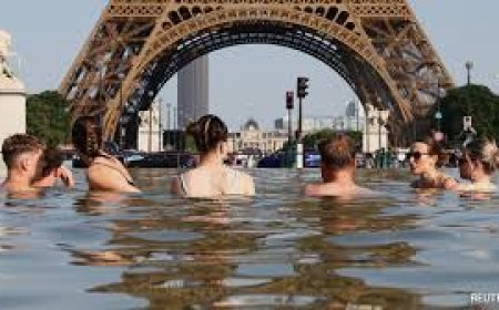 40 Drown Across France As It Sees Its Hottest Day EverPeople cool off in the Trocadero Fountain next to the Eiffel Tower