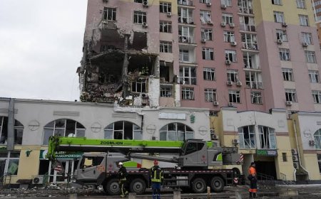 In one of Kyiv's most frequently bombed neighborhoods, residents choose to stay